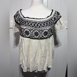 American Eagle cream with black embroidery baby doll or off shoulders top
